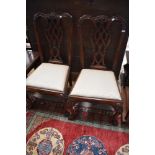 A pair of mahogany Chippendale revival dining chairs