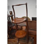 An early 20th Century mahogany folding cake stand