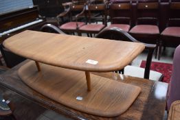 A small Ercol shelf, mid to light colour