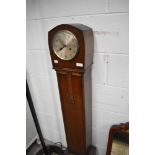 A 20th century grandmother clock having carved detailing to front and ornate beading.