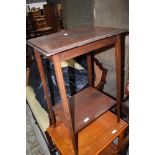 An Edwardian mahogany occasional table having line inlay decoration to slender tapered legs, width