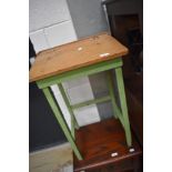 A vintage childs wooden desk