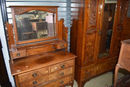 A Victorian mahogany and walnut wardrobe and dressing table