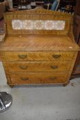 A Victorian Aesthetic scumbled pine chest /wash stand having tiled back, width approx. 100cm