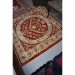 A traditional rug, approx. 140 x 135cm