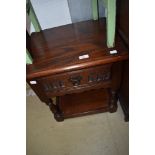 An oak Priory style (Wood Bros) occasional low table with drawer, width approx. 46cm