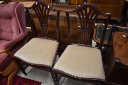 A pair of early 19th Century mahogany framed dining chairs