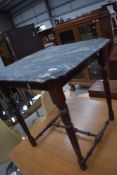 A Victorian stained frame occasional table having later marble effect formica top