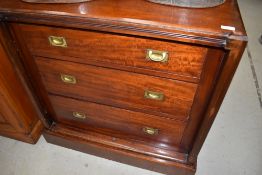 A 19th Century mahogany chest of four long drawers, with campaign style handles, width approx. 86cm