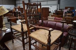 A set of eight (six plus two) traditional oak spindle back kitchen dining chairs