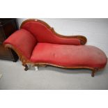 A Victorian stained frame chaise longue