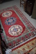 A traditional Oriental style rug, approx. 183 x 121cm