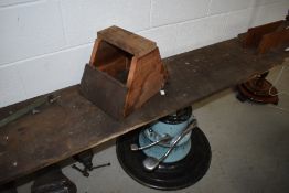 A motorcycle lift having hydraulic repurposed barbers/dentist chair base