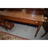 A Victorian mahogany school desk having interesting (but slightly purile) graffiti throughout.