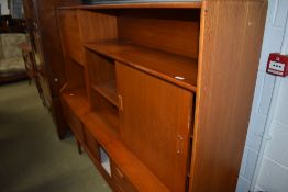 A teak sideboard of stylised design, width approx. 183cm