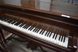 An early 20th Century mahogany cased baby grand piano by Eavestaffe (af)