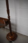 An early 20th century mahogany standard lamp