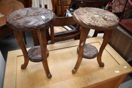 Two carved stools