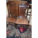 Two period oak solid seat hall chairs