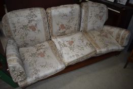 A vintage stained frame drop end settee with bergere canework and later cushions etc