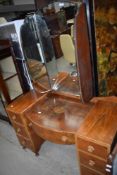 An early to mid 20th Century walnut dressing table