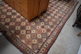 A large kazak style carpet square, approx. 345 x 220cm