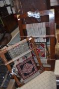 Two vintage weaving looms of small proportions