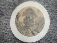 Chinese (20th century), a watercolour on fabric, circular landscape, 22cm dia