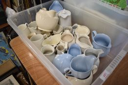 A selection of ceramic milk water and cream jugs