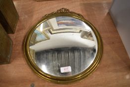 A brass framed convex hall mirror