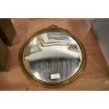 A brass framed convex hall mirror