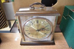 A mid century mantle clock by Metamec having brass and composite case