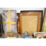 A selection of various size oak picture frames