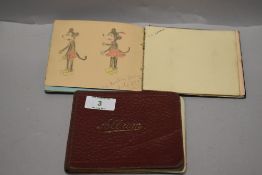 Two autograph books, to include a selection of ditties and drawings, predominantly 1920s-40s.
