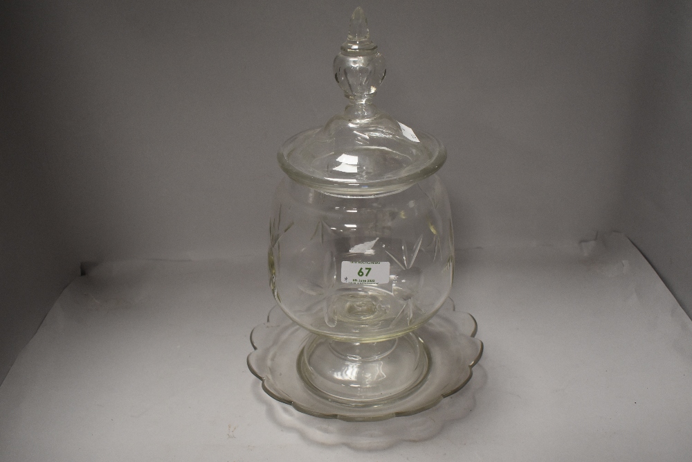 A late Victorian cut glass lidded pickle jar.