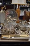 A selection of silver plated table wares including gallery trays and claret jug