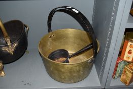 A large brass jam pan and similar sauce pot