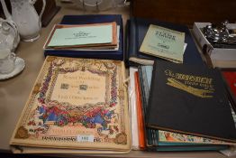 A box of World Stamps in albums, mint and used