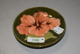 A 20th century pin dish by Moorcroft in the Hibiscus pattern good condition no chips or damage