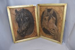 A pair of equine interest horse plaques having raised imagery