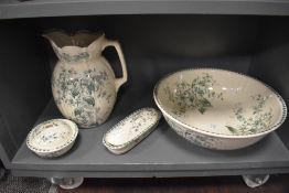 A Victorian wash jug and bowl set by Stoke pottery no.500 bowl and soap container both AF