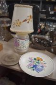 Three pieces of Poole pottery including lamp base plate and pin dish