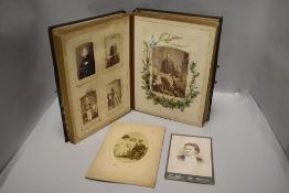 A decorative album of predominantly Victorian photographs, some interesting poses and settings.