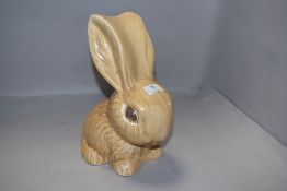 A large light brown Sylvac rabbit 1028 impressed to underside.