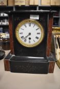 A Victorian bracket style clock having black slate and red marble case with enamel face