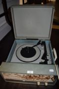 A portable vintage vinyl record player