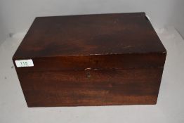 A mahogany sewing case having compartment fitted interior