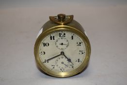 A zenith watch Co brass alarm clock.