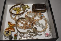 A small selection of costume jewellery including crystal beads, brooches, bangles and small