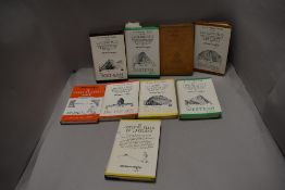 A collection of Wainwright books.